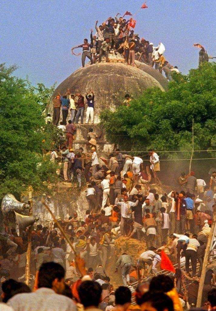 Hindutva mob destroying the Babri Masjid in Ayodhya in 1992.